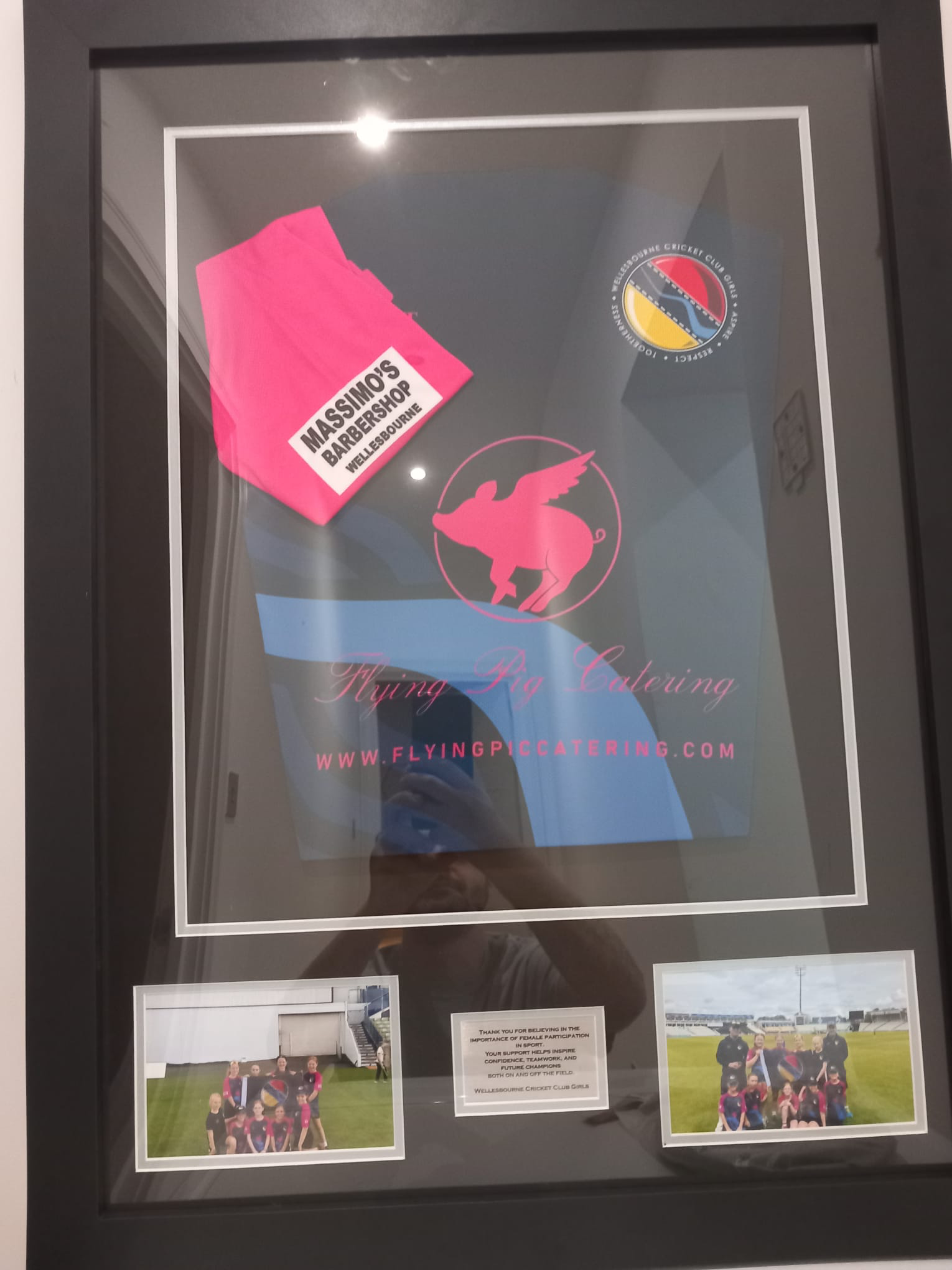 Framed Wellesbourne Cricket Club girls shirt thanking Massimo’s for supporting female participation in sport
